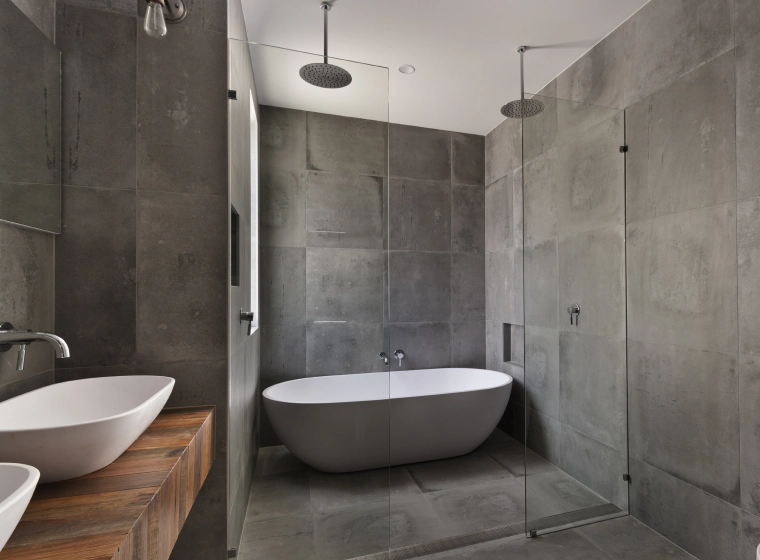 bathroom area with sink and tub